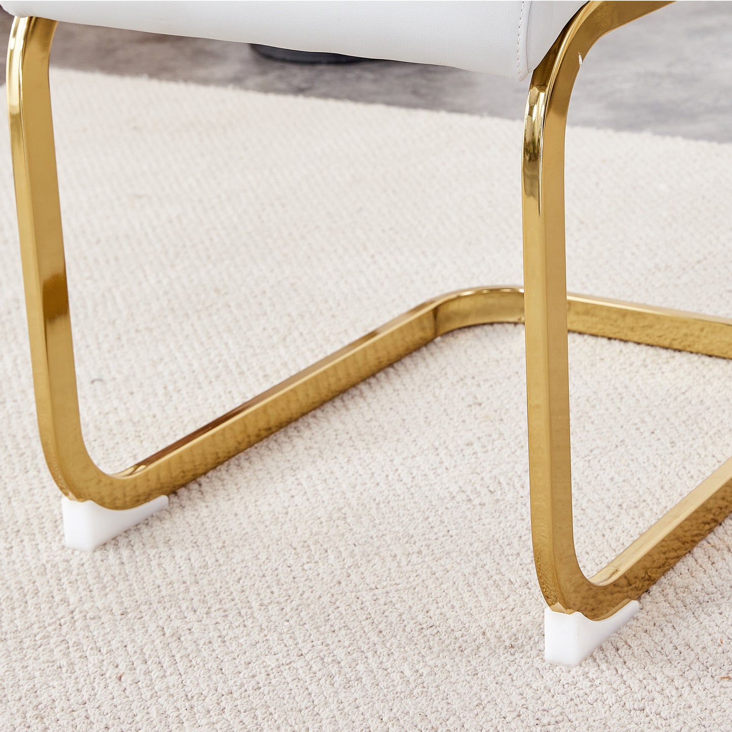 Melysen Table and Chair Set. 1 Table+4 White Pu Backrest Cushions with Gold Metal Leg Chairs . A Rectangular White Imitation Marble Desktop with Mdf Legs and Gold Metal Decorative Strips